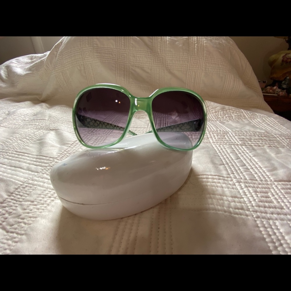 Coach turquoise sunglasses.